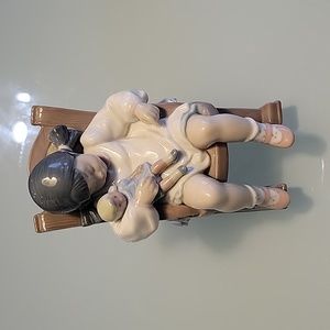 Lladro #5448 Naptime / Girl with Baby doll in Rocking chair